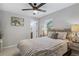 Bright bedroom with a queen bed and ensuite bathroom at 4643 S Cherokee St, Englewood, CO 80110