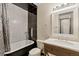 Updated bathroom with a clawfoot tub and modern vanity at 3600 S Pierce St # 5-101, Denver, CO 80235