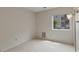 Bright bedroom with neutral walls and carpeted floor at 3600 S Pierce St # 5-101, Denver, CO 80235