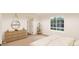 Bedroom with dresser, large window, and access to another room at , Aurora, CO 80019