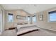 Bright and airy main bedroom with vaulted ceilings and large windows at 1820 S State Highway 83, Franktown, CO 80116