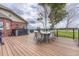 Large deck with hot tub and outdoor dining area at 1820 S State Highway 83, Franktown, CO 80116