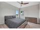 Bright bedroom with a queen-size bed and a ceiling fan at 1820 S State Highway 83, Franktown, CO 80116