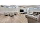 Finished basement with a comfortable seating area and large windows at 1820 S State Highway 83, Franktown, CO 80116