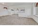 Spacious living room with neutral carpeting and lots of natural light at 1820 S State Highway 83, Franktown, CO 80116