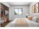 Bright bedroom with a queen-size bed and a spacious closet at 240 N Holcomb Cir, Castle Rock, CO 80104