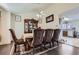 Formal dining room with a dark wood table and matching chairs at 20937 Kelly Pl, Denver, CO 80249