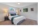 Bright bedroom with carpeted floors and neutral wall colors at 7946 Joan Dr, Denver, CO 80221
