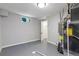 Unfinished basement area with laundry hookups and storage at 7946 Joan Dr, Denver, CO 80221