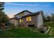 Landscaped backyard with partial view of house at 20127 Aintree Ct, Parker, CO 80138