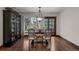 Formal dining room with hardwood floors and a chandelier at 20127 Aintree Ct, Parker, CO 80138