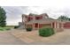 Exterior of a two-story townhome with attached garage at 13722 Legend Way # 101, Broomfield, CO 80023