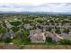 Wide view of community, highlighting golf course and lake at 13722 Legend Way # 101, Broomfield, CO 80023