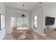 Cozy breakfast nook with a table and chairs, near back door access at 13722 Legend Way # 101, Broomfield, CO 80023