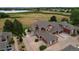 Home's rear elevation, showcasing patio and parking area at 13722 Legend Way # 101, Broomfield, CO 80023