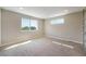 Bright bedroom with carpet and large window at 8500 W 62Nd Ave # H, Arvada, CO 80004