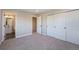 Spacious bedroom with a large closet and access to a full bathroom at 8500 W 62Nd Ave # H, Arvada, CO 80004