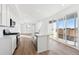 Modern kitchen with white cabinets and stainless steel appliances at 1268 Penner Dr, Erie, CO 80026