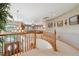 Open upper hallway with views to the living room and entryway at 6398 Lost Canyon Ranch Rd, Castle Rock, CO 80104