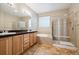 Bathroom with double vanity, soaking tub, and shower at 4208 County View Way, Castle Rock, CO 80104