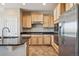 Modern kitchen with stainless steel appliances and granite countertops at 4208 County View Way, Castle Rock, CO 80104