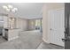 Bright and spacious entryway with tile flooring and access to kitchen and living areas at 14321 E Tennessee Ave # 1-105, Aurora, CO 80012