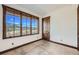 Bright bedroom with large windows offering mountain views at 964 Alpensee Dr, Breckenridge, CO 80424