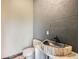 Bathroom with a unique petrified wood sink and dark-grey wall at 964 Alpensee Dr, Breckenridge, CO 80424