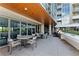 Outdoor patio with tables, chairs, and grills at 4200 W 17Th Ave # 11, Denver, CO 80204