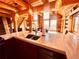 Gourmet kitchen with stainless steel appliances and mountain views at 13640 Old Paint Trl, Conifer, CO 80433