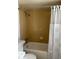 Bathroom with shower/tub combo and tiled walls at 8060 E Girard Ave # 711, Denver, CO 80231