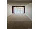 Spacious living room with large windows and carpet at 8060 E Girard Ave # 711, Denver, CO 80231