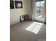Bright bedroom with large window and wall-to-wall carpet at 8060 E Girard Ave # 711, Denver, CO 80231