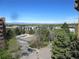 Community view with tennis court and mountain backdrop at 8060 E Girard Ave # 711, Denver, CO 80231