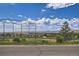 View of a baseball field and distant mountains at 13305 W 82Nd Ave, Arvada, CO 80005