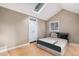 Main bedroom with skylight, hardwood floors, and double doors at 28532 Shadow Mountain Dr, Conifer, CO 80433