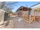 Deck and stairs leading to a fenced backyard at 19695 E Amherst Dr, Aurora, CO 80013