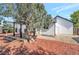 Home's backyard features a deck and pergola at 8465 Wheatgrass Cir, Parker, CO 80134
