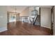 Bright dining area with laminate flooring, patio access and view of the kitchen at 8465 Wheatgrass Cir, Parker, CO 80134