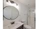 Updated bathroom features a vanity, toilet, and shower at 8465 Wheatgrass Cir, Parker, CO 80134