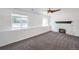 Finished basement Gathering room with a fireplace and carpet flooring at 8465 Wheatgrass Cir, Parker, CO 80134