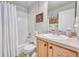 Clean bathroom with shower/tub combo and updated vanity at 7193 S Versailles Way, Aurora, CO 80016