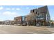 Modern street view showing shops and businesses at 3230 S Bannock St, Englewood, CO 80110