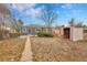 Backyard with storage shed and access to the home at 1929 Jamaica St, Aurora, CO 80010