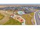 Community pool, playground, and green space at 6335 E 143Rd Dr, Thornton, CO 80602