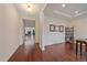 Bright home office with hardwood floors and built-in shelving at 6335 E 143Rd Dr, Thornton, CO 80602