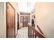 Bright entryway with wood flooring and staircase at 10765 Deerfield Rd, Franktown, CO 80116