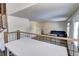 Living room with sectional sofa and wood-look flooring at 4197 Deer Watch Dr, Castle Rock, CO 80104