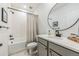 Bathroom with a shower/tub combo and modern vanity at 3839 Buchanan Way, Aurora, CO 80019