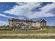 Large hotel with pool and outdoor seating area at 2150 S Gold Bug Way, Aurora, CO 80018